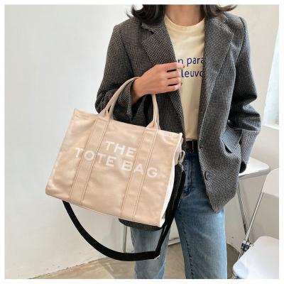 China Casual Designer Fashion Canvas Tote Bag Women Large Handbags Luxury Brand Letters Shoulder Bags for sale