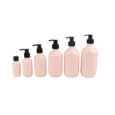 China Personal Care 250ml 300ml 500ml Amber Clear Round PET White Bottle With Pump Sanitizer Packing White Hand Wash Lotion Bottle for sale