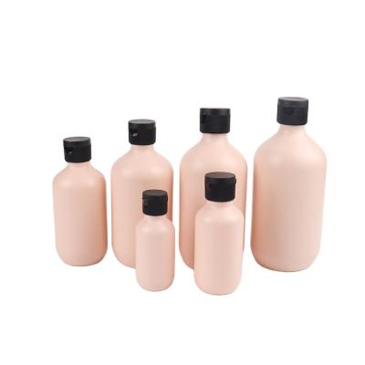 China Custom PE Plastic Cosmetic Bottles Personal Care Packaging Pink Plastic Lotion Bottle With Pump 60ml 100ml 200ml 300ml 400ml 500ml for sale