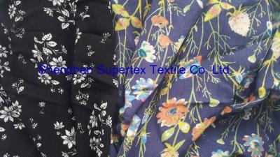 China Soft Rayon Lawn Fabric With All Over Reactive White Floral Print On Semi Bleached Background for sale