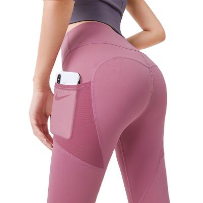 China Fashion Breathable Plus Size Yoga Gaiters Sport Yoga Pants With Pockets Factory Seamless Fitness Yoga Active Wear For Women for sale