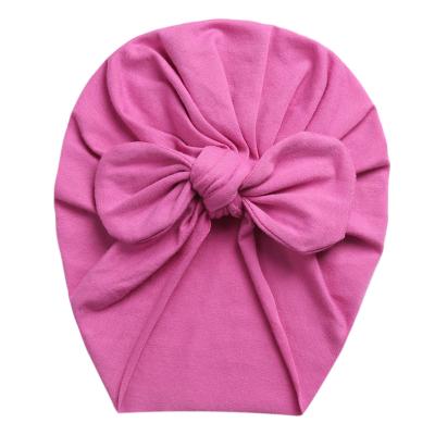 China Neutral/both men's and women's Europe and the United States polychromatic sets of new hat main spring bow, summer, autumn rabbit ear knot India hat baby ha for sale