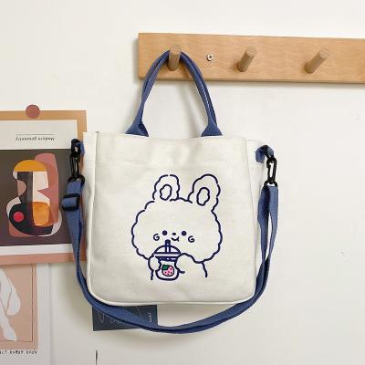 China Cool And Soft Wholesale Custom Canvas Bag Durable Logo Printed School Student Shoulder Bag With Handles for sale