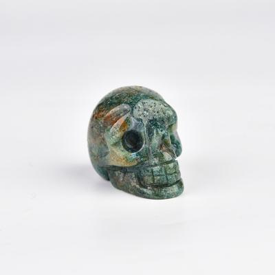 China Wholesale China High Quality Moss Agate Skull Carving Skull Quartz Stones Crystal Skull for sale