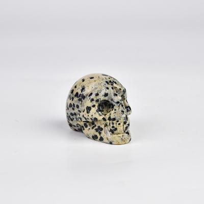 China Wholesale High Quality China Dalmation Skull Carving Skull Quartz Stones Crystal Skull for sale