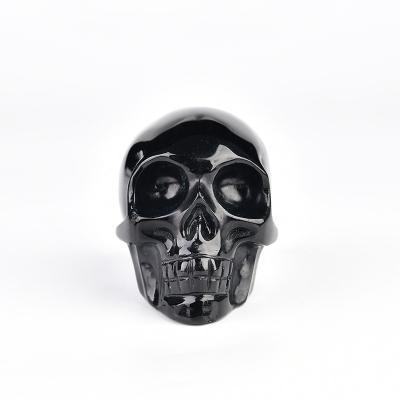 China Wholesale High Quality Natural Black Obsidian Skull Quartz Stones Crystal Skull From China for sale