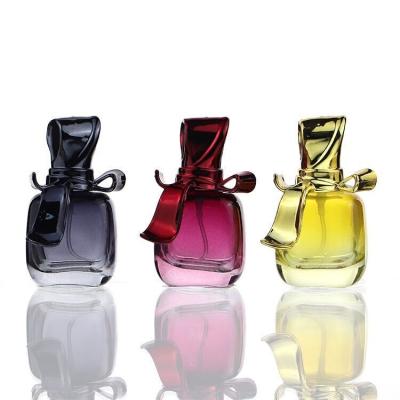 China Custom Color 15ml Cosmetic Perfume Bottle Travel Bowknot Glass Empty Perfume Bottle With Spary for sale