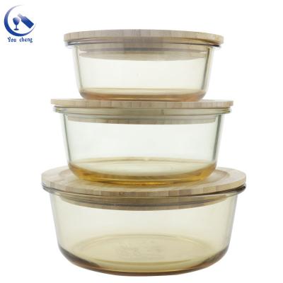 China Youcheng Sustainable Round 131-171mm Amber Glass Food Meal Salad Bowl With Wooden Lid for sale