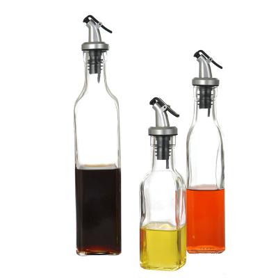 China Frying Oil Youcheng Kitchen Control Olive Cooking Oil Vinegar Glass Measuring Bottle With Pourer Drizzle Lid for sale