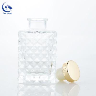 China Environmental Friendly Hot Sale 100ml Grid Reed Diffuser Glass Bottle Reed Diffuser Empty Bottle Glass for sale