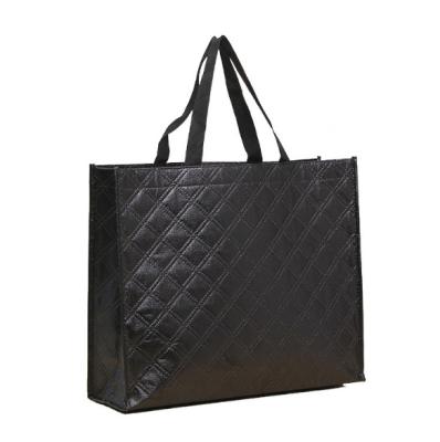 China Custom Laser Handled Black Embossed PP Laminated Non Woven Fabric Tote Bag Reusable Shopping Bag for sale