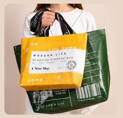 China China Manufacturer Reusable Laminated Handled PP Woven Shopping Bag Recycled Grocery Woven Bag With Custom Logo for sale