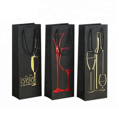 China Black Recyclable Custom Simple Packaging Gift Bag Paper Wine Bottle Paper Cardboard Carry Bags for sale