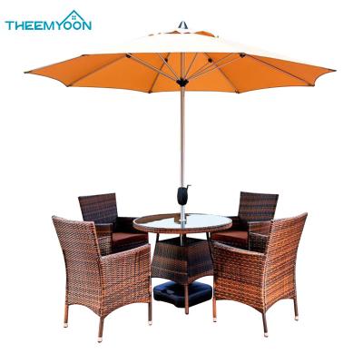 China Durable Rattan Garden 4 Chairs And Outdoor Set Furniture Backyard Round And Aluminum Umbrella Table Patio for sale