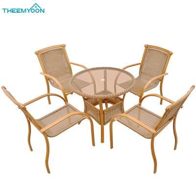 China Eco-freindly Modern Outdoor Patio Furniture Set Rattan Patio Garden Coffee Table and Set of 4 Chairs for sale