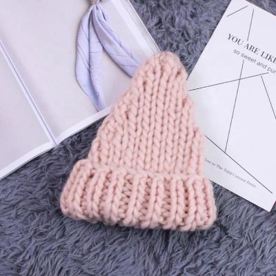 China COMMON female winter wool beanies hats hand raw thick knitted warm hat for sale