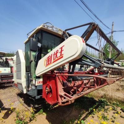 China Rice Sell Well WORLD Flagship Edition With Cabin 4LZ-7.0EM Self Propelled Full Crawler Feed Grains Combine Harvester For Farms for sale