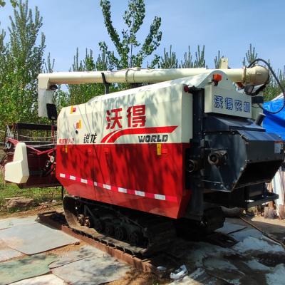 China Hot Selling WORLD Exclusive Editio Rice With Cabin 4LZ-6.0E Self Propelled Full Crawler Feed Grain Combine Harvester For Farms for sale