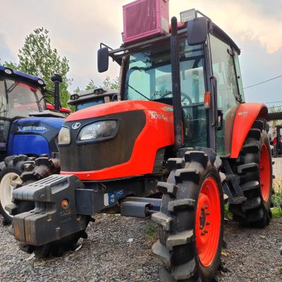 China Farms Second Used Japanese Farm Tractor Kubota M704KQ 70HP Wheel Compact Tractor With Cabin Farm Machinery /Equipment for sale