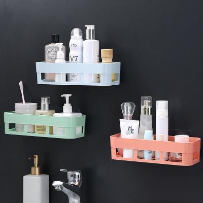 China Wall Mounted Type Bathroom Accessories Living Room Wall Mounted Suction Plastic Storage Rack Shelf Traceless Tape Plastic Bathroom Wall Shelf for sale