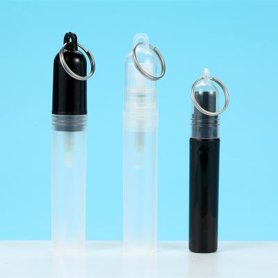 China 3ml 5ml Cosmetic Cylindrical Perfume Disinfectant Plastic Spray Bottle Empty Packing Bottle With Keychain for sale