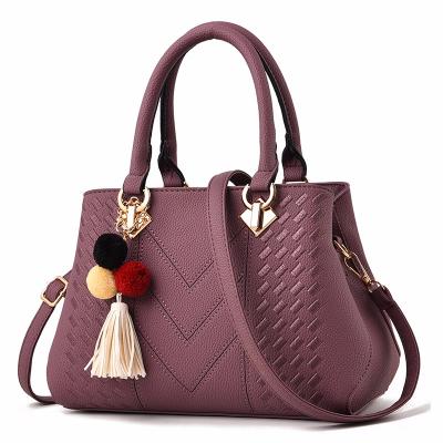 China 2021 New Arrival High Quality Women Top Handle Handbag With Tassel Hot Selling Ladies Female Leather Handbags For Women for sale