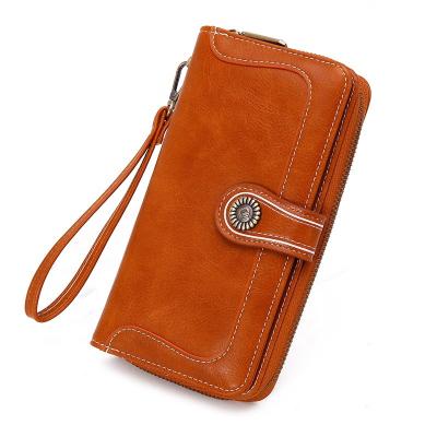 China Hot Retro Long Women's Fashionable Large Capacity Ladies Wallets Pinch Cell Phone Multifunctional Bag Wallet Leather Women for sale