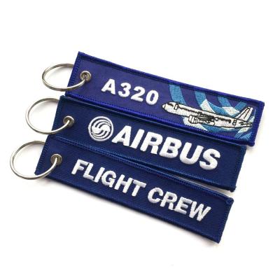 China Office/School/Advertising/Promotional Gift Best Selling Aviation Key Chain Custom Embroidered Key Chain for sale