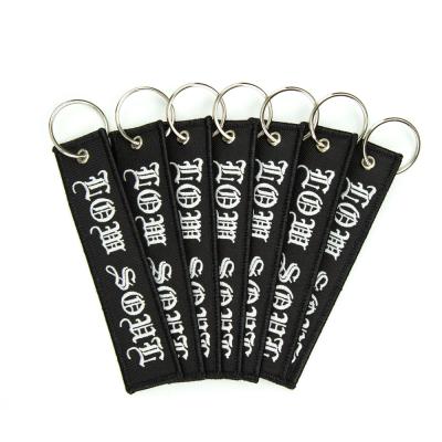 China Custom Cheap Promotional Gifts Jet Tag Fabric Embroidery Car Keychains Woven Key Chain Eco - Friendly for sale