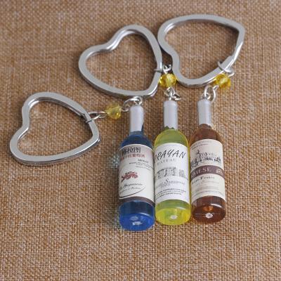 China Bottle Colorful Design Promotional Gift Heart Shape Metal Keychain Accessories Novelty Wine Key Chain for sale