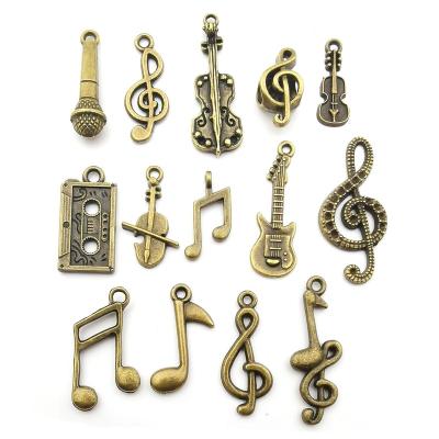 China Jewelry Making Mixed 70pcs/lot Antique Bronze Musical Note Musical Instrument Charms Pendants For Jewelry Making for sale