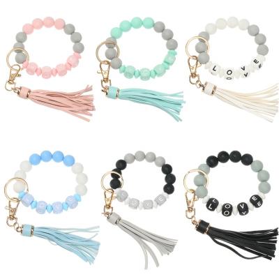 China Support Key Chain Around Silicone Beads and Square Mixed Beads Bracelet LOVE Beads Key Chain for Car Ring PU Tassel Candy Color Bracelet Key Chain for sale