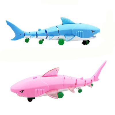 China Bring Toy Kids Shark Plastic Light-Up Cheerful LED Toys With String For Kids Party Toy Leash Car Universal Electric Animal for sale