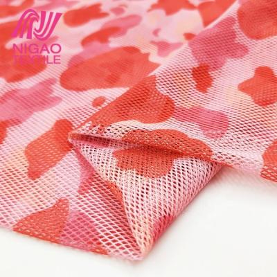 China Custom stretch pattern printed fabric 4way stretch polyester spandex fabric mesh fabric for bikini ladies wear for sale