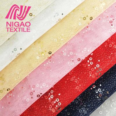 China Breathable Sequin Fabric Wholesale Christmas Glitter Tulle Fabric For Clothes for sale