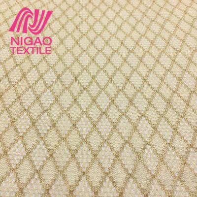 China Gold Yarn Fabric Diamond Knitting Mesh Fabric With Gold Yarn For Clothing for sale