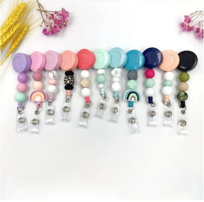 China 360 Swivel Clip Silicone Bead Pull Buckle Roll Key Easy Key Roll ID Access Card Fashion Silicone Bead Work Card Student Badge for sale