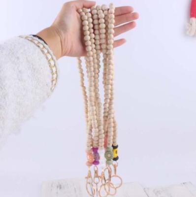 China FASHION Silicone Daisy Bead Keychain Lanyard Wooden Pearl Necklace Beads Key Chain Pendant Necklace Lanyard for sale