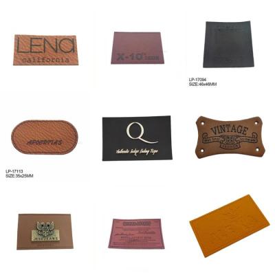 China Custom Viable Hardware Metal Logo Leather Garment Ornament Tag Patches For Jeans for sale