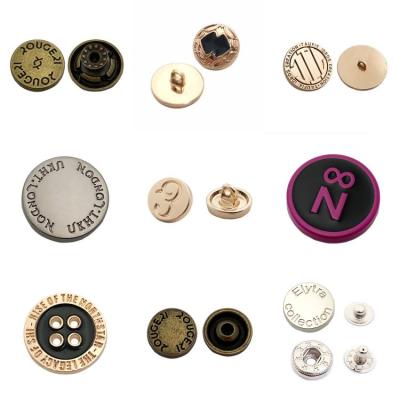 China Dry Cleaning Brushed Antique Brass Color Custom Logo Raised Metal Buttons For Jeans for sale