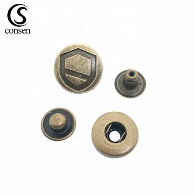 China Custom debossed washable antique brass color name logo apparel snap button smooth for dress for sale