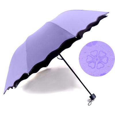 China Flower 21inch 8 Ribs Water Flower Promotional Magic Umbrella 3 Folds Umbrella for sale