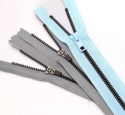 China Factory direct wholesale invisible zipper 3# nylon End-end colorful polyester fabric tape clothing zippers in stock for bags pants for sale