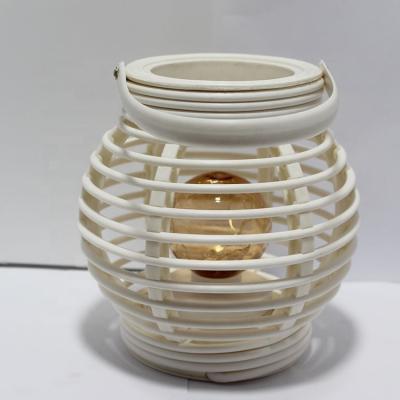 China Modern home deco table lamp rattan battery operated lantern with led bulb for sale