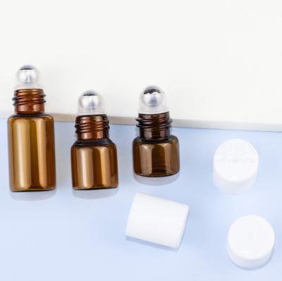 China Best-selling Roll-on Bottle 1ml 2ml 3ml Brown Model Bottle Roll-on Jacket Package Manufacturer Perfume Rollerball Bottle for sale