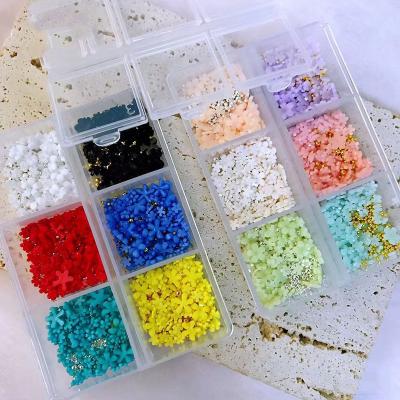 China Newest Acrylic Nail Art Charms For Nail Art Mini White Resin 3D Flowers Gold Beads Art Decoration New Design Nail Art for sale