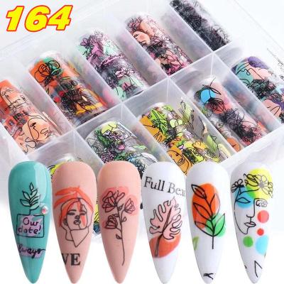 China Art Decor Manicure Self Adhesive Colorful Foil Gel Polish Paper Nail Sticker Lady Face Nail Decals Nail Art Decoration Sticker Abstract Newest Nail for sale