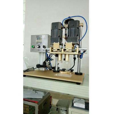 China Hotels Daily Chemical Medical Pump Head Locking Capping Machines Automatic Cover Twisting Machine for sale