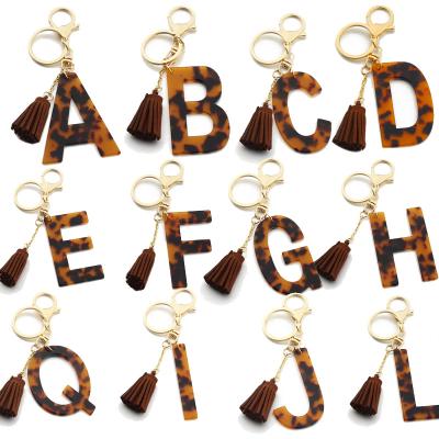 China New Arrival Letter Shape Pendant Accessories Gold Key Ring Leopard Print Pendant Letter Key Chains Accessories For Women And Girls for sale