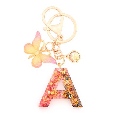 China Letter Shape Pendant Accessories Shape Alphabet Initial Letter Butterfly Tassel Key Chain Pendant Keychain for sale